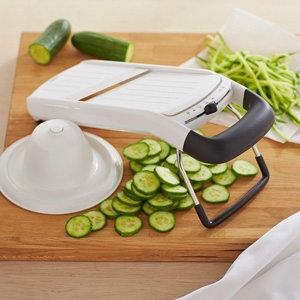 OXO Simple Mandoline $50 - Williams-Sonoma Angled stainless-steel blade easily adjusts for three precise thicknesses, plus julienne strips.