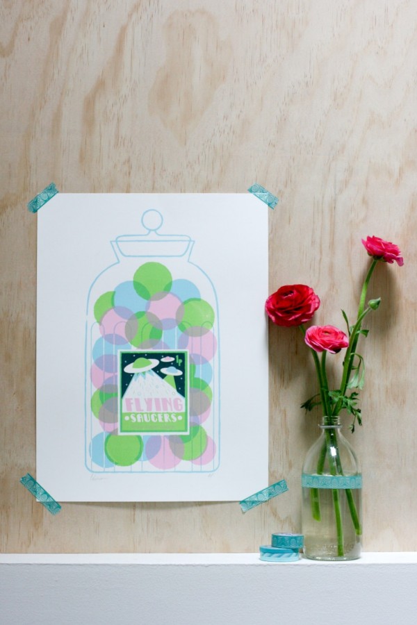 Create an instant vignette by using Typo's tape on Peskimo's Flying Saucers print and the glass bottle of ranunculus, via WeeBirdy.com