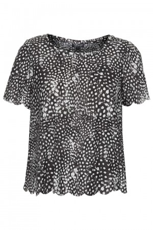 Shop the Bird Trend: Mono feather scallop top, £18 from Topshop.