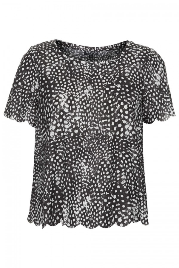 Shop the Bird Trend: Mono feather scallop top, £18 from Topshop.