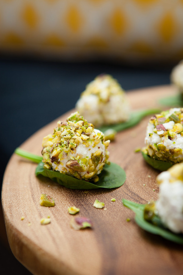 Super-easy Christmas entertaining: pistachio-covered goats cheese balls, on Rustic Serving Board from Freedom. Christmas entertaining at home with Wee Birdy, via WeeBirdy.com.