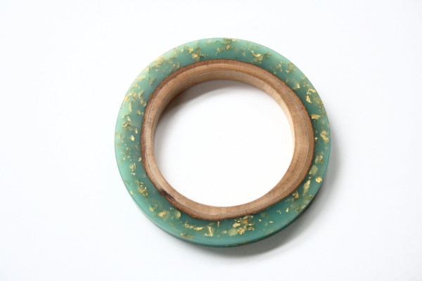 Large bangle handmade from Australian wood and teal blue resin with embedded gold leaf flakes, AU$109, by Bold B, via WeeBirdy.com.  