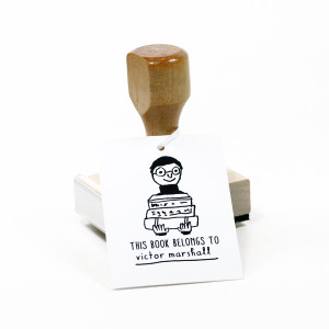 25 Excellent Presents for Book Lovers, via WeeBirdy.com: Happy reader personalized stamp, AU$42.24, from The Small Object's Etsy shop.