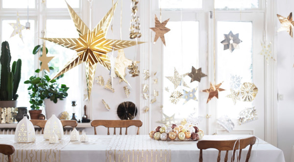 Add a touch of whimsy to your Christmas table with IKEA's hanging stairs and gold baubles.