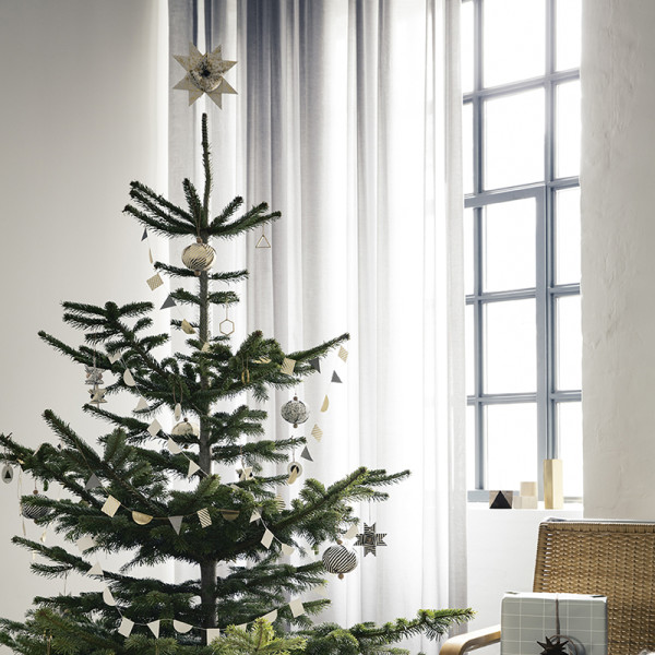 A mix of gold-speckled ornaments adorn Ferm Living's Christmas tree. Photography courtesy of Ferm Living. 