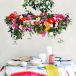 Tutorial: Make a hanging flower chandelier for your next party We created this gorgeous hanging flower chandelier from scratch in an afternoon for a statement centrepiece that looks incredible – and smells heavenly. Photo: Lisa Tilse for We Are Scout