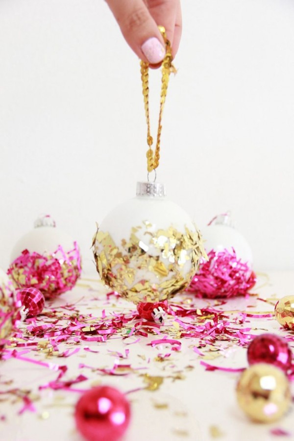 Make confetti-dipped ornaments by A Bubbly Life.
