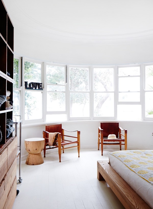 The eggcup is used as a side table in Mark and Louella Tuckey's gorgeous. bedroom. Photo via The Design Files. 