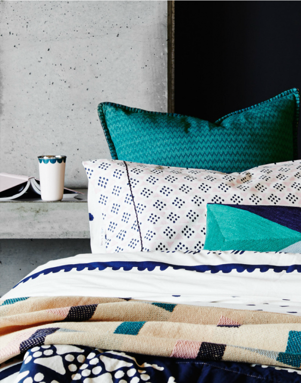 Reversible blanket stitch cushion by Sage and Clare.