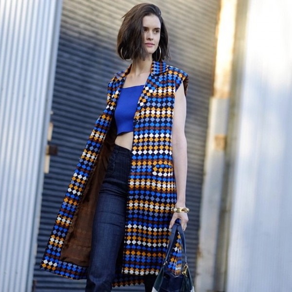 Chloe wears Easton Pearson vest, Citizens of humanity flares, Jerome Dreyfuss bag, Nicholas Kirkwood shoes and Christie Nicolaides jewellery. Photo by Myles Kalus @streetstyleaustralia/Instagram. 