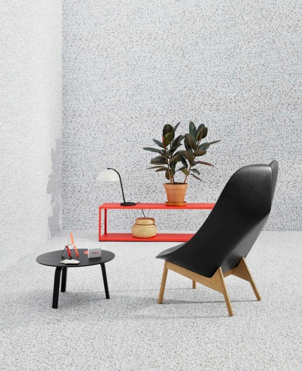 Uchiwa lounge chair by Doshi Levien; Bella coffee table by HAY; New Order red shelf by Stefan Diez; Playing cards by Clara Von Zweigbergk; Bamboo basket selected by HAY; white cloche table light by Lars Beller Fjetland.