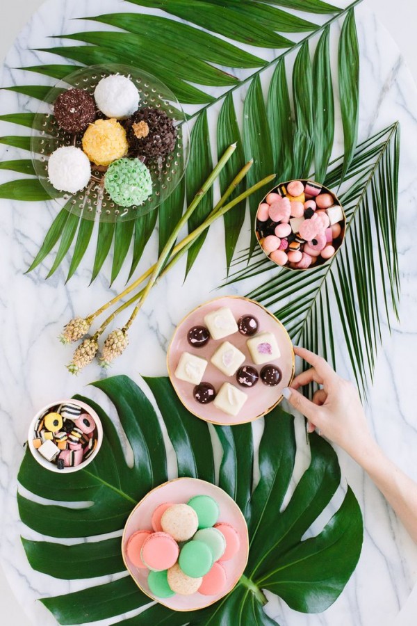 Palm fronds and bon-bons party via Studio DIY.