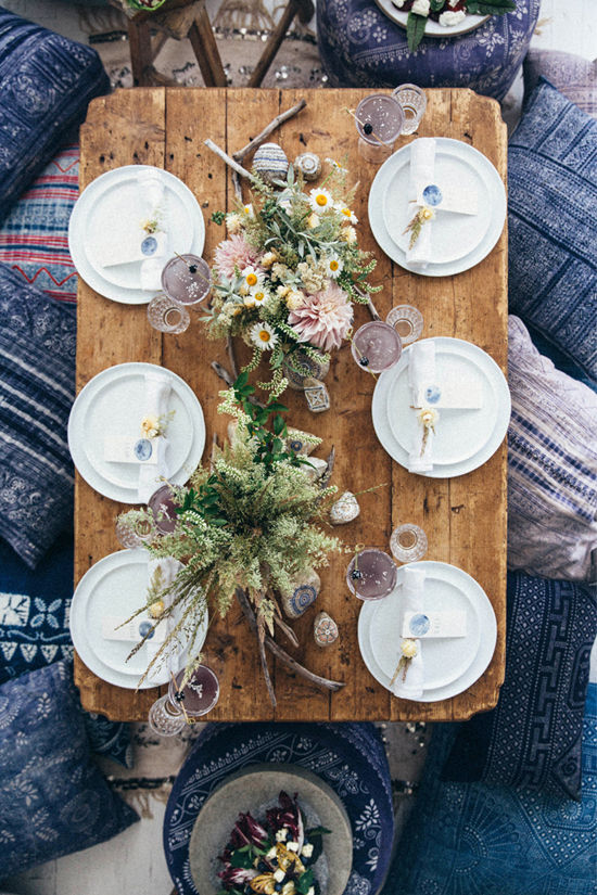 Feast on the floor with indigo cushions, paired with indigo place cards and whimsical pastel flowers. Head to Design Love Fest for more details from their incredible moon party. 