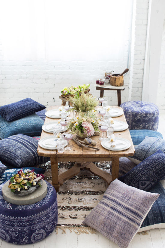 Feast on the floor with indigo cushions, paired with indigo place cards and whimsical pastel flowers. Head to Design Love Fest for more details from their incredible moon party.