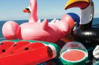 Christmas Gift Guide: Kris Kringle Gifts Under $30 Sunnylife inflatable watermelon ball from Lark.