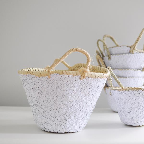 White sequin baskets and planters.