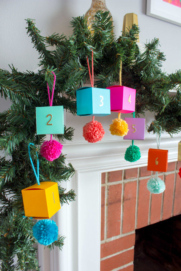 Image via Oh Happy Day. http://ohhappyday.com/2015/11/diy-paper-ornament-advent-calendar/