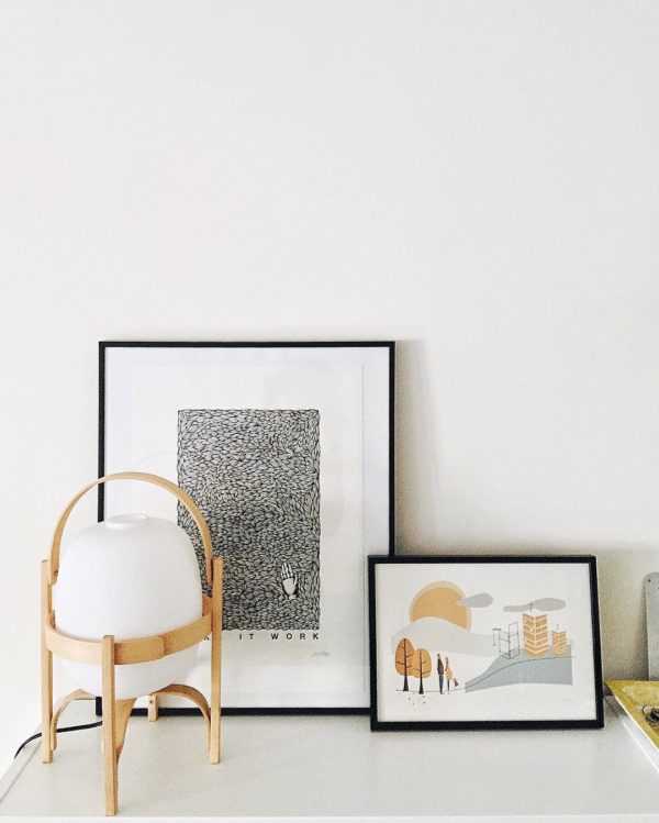 The organic shape of the Cesta lamp softens the geometric lines in this vignette, by Ines Garp. 